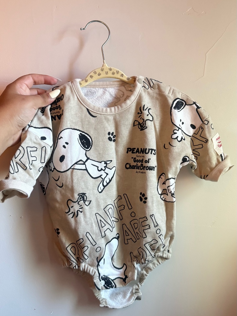 Peanuts Snoopy Cream Baby Onesie with Black Graphics